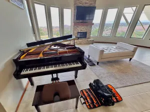 Tuning a Bergmann grand in Placitas, NM.