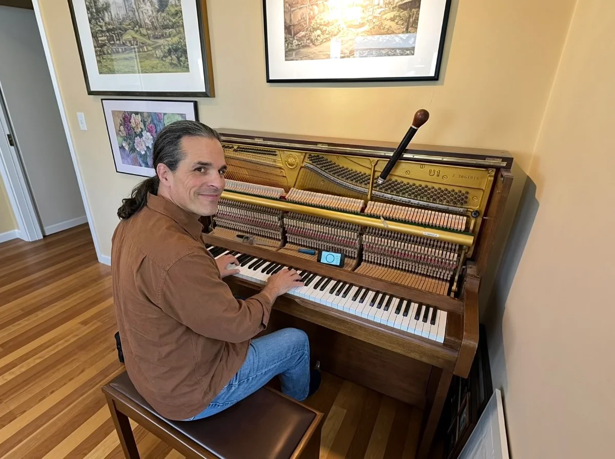 Tom Lepinski tuning a Yamaha studio upright in Tijeras, NM.